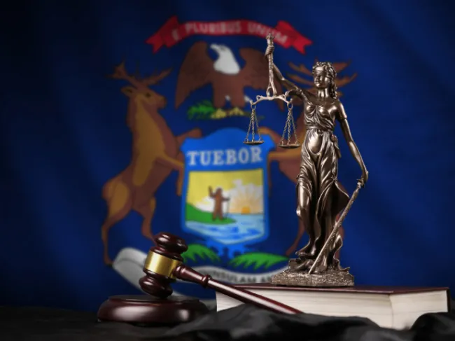 michigan flag and judge gavel